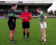 2 March 2002; Nemo Rangers captain Colin Corkery, left, and Charlestown Sarsfield captain David Tiernan wait for the result of the coin toss from referee Michael Monahan prior to the AIB GAA Football All-Ireland Senior Club Championship Semi-Final match between Nemo Rangers and Charlestown Sarsfield at McDonagh Park in Nenagh, Tipperary. Photo by Damien Eagers/Sportsfile