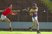 9 March 2002; Barry Cambert of Wexford in action against Mark Prendergast of Cork during the Allianz National Hurling League Division 1B Round 2 match between Cork and Wexford at Páirc Uí Chaoimh in Cork. Photo by Brendan Moran/Sportsfile