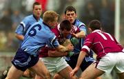 3 March 2002; Michael Ennis of Westmeath in action against Dublin's Declan Darcy, left, and Mick Casey, right, during the Allianz National Football League Division 1A Round 4 match between Dublin and Westmeath at Parnell Park in Dublin. Photo by Ray McManus/Sportsfile