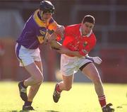 9 March 2002; Niall Ronan of Cork in action against Eddie Doyle of Wexford during the Allianz National Hurling League Division 1B Round 2 match between Cork and Wexford at Páirc U’ Chaoimh in Cork. Photo by Brendan Moran/Sportsfile