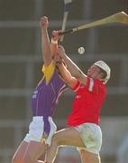 9 March 2002; Adrian Fenlon of Wexford in action against Timmy McCarthy of Cork during the Allianz National Hurling League Division 1B Round 2 match between Cork and Wexford at Páirc Uí Chaoimh in Cork. Photo by Brendan Moran/Sportsfile