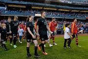 11 June 2013; Republic of Ireland captain Robbie Keane and mascot Tara McDermott lead the team out prior to the International Friendly match between Republic of Ireland and Spain at Yankee Stadium in The Bronx, New York, USA. Photo by David Maher/Sportsfile