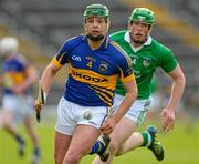 31 May 2013; Andrew Ryan of Tipperary in action against Shane Dowling of Limerick during the Bord Gais Energy Munster GAA Under 21 Hurling Championship Quarter-Final match between Tipperary and Limerick at Semple Stadium in Thurles, Tipperary. Photo by Matt Browne/Sportsfile