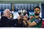 17 February 2017; FAI President Tony Fitzgerald presents the President's Cup to Cork City captain Greg Bolger at the end of the the President's Cup match between Dundalk and Cork City at Turner's Cross in Cork. Photo by David Maher/Sportsfile