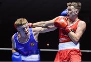 17 February 2017; Wayne Kelly of Ballynacargy, left, exchanges punches with Sean McComb of Holy Trinity during their 64KG bout at the 2017 IABA Elite Boxing Championship finals in the National Stadium, Dublin. Photo by Eóin Noonan/Sportsfile
