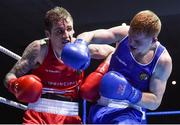 17 February 2017; Brett McGinty of Oakleaf, right, exchanges punches with Dean Walsh of St Ibars during their 69KG bout at the 2017 IABA Elite Boxing Championship finals in the National Stadium, Dublin. Photo by Eóin Noonan/Sportsfile