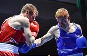 17 February 2017; Brett McGinty of Oakleaf, right, exchanges punches with Dean Walsh of St Ibars during their 69KG bout at the 2017 IABA Elite Boxing Championship finals in the National Stadium, Dublin. Photo by Eóin Noonan/Sportsfile