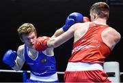 17 February 2017; Stephen Broadhurst of Dealgan, left, exchanges punches with Emmett Brennan of Glasnevin during their 75KG bout at the 2017 IABA Elite Boxing Championship finals in the National Stadium, Dublin. Photo by Eóin Noonan/Sportsfile