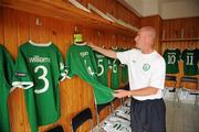 23 July 2011; Republic of Ireland kitman Jacko Smyth hangs the jersey of captain John Egan ahead of the teams arrival at Mogosoaia. 2010/11 UEFA European Under-19 Championship - Group A, Czech Republic v Republic of Ireland, Football Centre FRF, Mogosoaia, Bucharest, Romania. Picture credit: Stephen McCarthy / SPORTSFILE