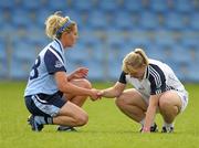 23 July 2011; A dejected Donna Berry, Kildare, is consoled by Amy McGuinness, Dublin, at the end of the game. TG4 Ladies Football All-Ireland Senior Championship Qualifier Round 1, Dublin v Kildare, Pearse Park, Longford. Photo by Sportsfile