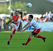 23 July 2011; Steven McDonnell, Armagh, in action against Ryan McMenamin, Tyrone. GAA Football All-Ireland Senior Championship Qualifier Round 3. Tyrone v Armagh, Healy Park, Omagh, Co. Tyrone. Picture credit: Michael Cullen / SPORTSFILE