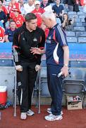 23 July 2011; Cork manager Conor Counihan speaks to the injured Daniel Goulding after he went off during the first half with an injury. GAA Football All-Ireland Senior Championship Qualifier Round 4, Cork v Down, Croke Park, Dublin. Picture credit: Brendan Moran / SPORTSFILE