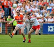 23 July 2011; Ciaran McKeever, Armagh, in action against Kyle Coney, Tyrone. GAA Football All-Ireland Senior Championship Qualifier Round 3. Tyrone v Armagh, Healy Park, Omagh, Co. Tyrone. Picture credit: Michael Cullen / SPORTSFILE