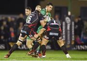 18 February 2017; Tiernan O'Halloran of Connacht is tackled by Rynard Landman, left, and Sam Hobbs of Newport Gwent Dragons during the Guinness PRO12 Round 15 match between Connacht and Newport Gwent Dragons at the Sportsground in Galway. Photo by Diarmuid Greene/Sportsfile