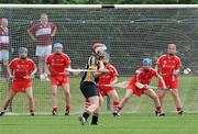 23 July 2011; Aoife Neary, Kilkenny, scores a point against Cork. All-Ireland Senior Camogie Championship in association with RTÉ Sport, Kilkenny v Cork, Jenkinstown, Co. Kilkenny. Picture credit: Matt Browne / SPORTSFILE