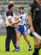 24 July 2011; Galway manager John McIntyre, left, congratulates Tony Browne, Waterford, as he leaves the field after being substituted. GAA Hurling All-Ireland Senior Championship Quarter Final, Waterford v Galway, Semple Stadium, Thurles, Co. Tipperary. Picture credit: Ray McManus / SPORTSFILE