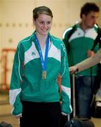 25 July 2011; Ireland's Ciara Mageean, silver medalist in the Women's 1500m, on her arrival at Dublin Airport as the Irish team return from the European Junior Athletics Championships in Talinn, Estonia. Dublin Airport, Dublin. Picture credit: Brendan Moran / SPORTSFILE