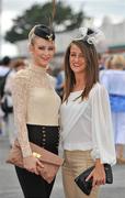 26 July 2011; Sisters Gabrielle Dunne, left, and Barbara Dunne, from Abbeyknockmoy, Co. Galway, during day 2 of the Galway Racing Festival 2011, Ballybrit, Galway. Picture credit: Diarmuid Greene / SPORTSFILE