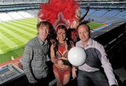 26 July 2011; Brazilian samba dancer Lule, from SD Dance, at the launch of Fever Pitch 2011, Sport & Music Event with MC for the night, Hector Ó hEochagáin, left, and GAA legend Peter Canavan. Croke Park, Dublin. Photo by Sportsfile