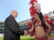26 July 2011; Sports commentator Jimmy Magee greets Brazilian samba dancer Lule, from SD Dance, at the launch of Fever Pitch 2011, Sport & Music Event. Croke Park, Dublin. Photo by Sportsfile