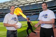 26 July 2011; Dublin footballer Barry Cahill, left, Donegal footballer Paul Durcan and and fire eater Martin Byford at the launch of Fever Pitch 2011, Sport & Music Event. Croke Park, Dublin. Photo by Sportsfile