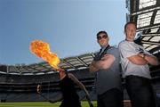 26 July 2011; Dublin footballer Barry Cahill, right, musician Ryan Sheridan and fire eater Martin Byford at the launch of Fever Pitch 2011, Sport & Music Event. Croke Park, Dublin. Photo by Sportsfile