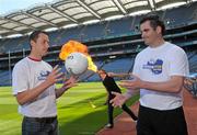 26 July 2011;  Dublin footballer Barry Cahill, left, Donegal footballer Paul Durcan and fire eater Martin Byford at the launch of Fever Pitch 2011, Sport & Music Event. Croke Park, Dublin. Photo by Sportsfile