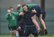21 February 2017; Andrew Conway of Ireland carries team-mate Kieran Marmion during squad training at Carton House in Maynooth, Co Kildare. Photo by Seb Daly/Sportsfile