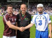 24 July 2011; Waterford captain Stephen Molumphy, shakes hands with Galway captain Damian Hayes, under the eye of referee Cathal McAllister. GAA Hurling All-Ireland Senior Championship Quarter Final, Waterford v Galway, Semple Stadium, Thurles, Co. Tipperary. Picture credit: Dáire Brennan / SPORTSFILE