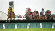 27 July 2011; Royal Reveille, with Mark Walsh up, left, goes over the second, second time round, on their way to winning the Tote Phone Bet 1850 238 669 Handicap Hurdle. Galway Racing Festival 2011, Ballybrit, Galway. Picture credit: Diarmuid Greene / SPORTSFILE