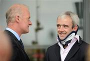 27 July 2011; Jockey Ruby Walsh in conversation with trainer Willie Mullins, left, during day 3 of the Galway Racing Festival 2011, Ballybrit, Galway. Picture credit: Diarmuid Greene / SPORTSFILE