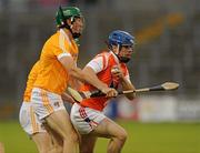 27 July 2011; Dean Nugent, Armagh, in action against James McCouaig, Antrim. Bord Gais Energy Ulster GAA Hurling Under 21 All-Ireland Championship Final, Antrim v Armagh, Casement Park, Belfast, Co. Antrim. Picture credit: Oliver McVeigh / SPORTSFILE