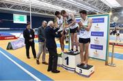 19 February 2017; Irish Olympic gold medallist at the 1956 Olympics, Ronnie Delany, presents John Travers, Donore Harriers AC, Dublin, with his bronze medal after the Men's 1500m Final during the Irish Life Health National Senior Indoor Championships at the Sport Ireland National Indoor Arena in Abbotstown, Dublin. Photo by Brendan Moran/Sportsfile