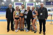 19 February 2017; Medallists in the Women's 60m, silver medallist Joan Healy, Bandon AC, Co Cork, gold medallist Ciara Neville, Emerald AC, Limerick, and bronze medallist Molly Scott, St Laurence O'Toole's AC, Co Carlow, with, from left, Ronnie Long, Past President, Athletics Ireland,  Georgina Drumm, President of Athletics Ireland, and Liam Hennessy, Past President, Athletics Ireland, during the Irish Life Health National Senior Indoor Championships at the Sport Ireland National Indoor Arena in Abbotstown, Dublin. Photo by Brendan Moran/Sportsfile