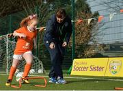23 February 2017; Eden Murphy, age 6, from St. Patrick's Girls' NS, goes through drills with Sharon Boyle, FAI Development Officer / U16 Girls' Head Coach, at the Aviva Soccer Sisters Exhibition by the St. Patrick’s Girls' NS. at Ringsend Astro Park with Irish Women’s International Aine O'Gorman. The Aviva Soccer Sisters Easter Camps, for girls aged between 7 and 12 years old, will take place in 120 venues across the country during the Easter break. For more details on the Aviva Soccer Sisters programme and where to find your local camp, log on to www.aviva.ie/soccersisters. Photo by Cody Glenn/Sportsfile