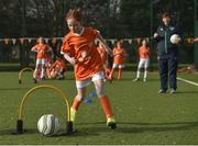 23 February 2017; Alannah Ferrari, age 9, from St. Patrick's Girls' NS, goes through drills at the Aviva Soccer Sisters Exhibition by the St. Patrick’s Girls' NS. at Ringsend Astro Park with Irish Women’s International Aine O'Gorman. The Aviva Soccer Sisters Easter Camps, for girls aged between 7 and 12 years old, will take place in 120 venues across the country during the Easter break.  For more details on the Aviva Soccer Sisters programme and where to find your local camp, log on to www.aviva.ie/soccersisters. Photo by Cody Glenn/Sportsfile