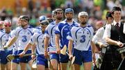 24 July 2011; The Waterford players, led by captain Stephen Molumphy, march behind the Sean Treacy Pipe band before the game. GAA Hurling All-Ireland Senior Championship Quarter Final, Waterford v Galway, Semple Stadium, Thurles, Co. Tipperary. Picture credit: Ray McManus / SPORTSFILE