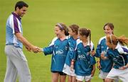 29 July 2011; Dublin senior footballer and Vhi GAA Cúl Camps ambassador Bernard Brogan with Aoife Rooney, Louise Fagan, Abbie Morgan, Clara Lindsay and Carly Reilly, at the Vhi GAA Cúl Camp in the Clann Mhuire GAA Club, the Naul, Co. Dublin. The ambassador programme sees 30 of Ireland’s greatest sporting heroes visiting Vhi GAA Cúl Camps throughout the country, providing coaching and tips, and answering questions from some of the 80,000 children expected to participate in over 1,000 camps. Clann Mhuire Gaelic Football Club, Naul, Co. Dublin. Picture credit: Ray McManus / SPORTSFILE