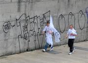 30 July 2011; Kildare supporters Nathan Doyle, left, and Tommy Morgan, from Castledermot, Co. Kildare, make their way along the Royal Canal to the game. GAA Football All-Ireland Senior Championship Quarter-Final, Donegal v Kildare, Croke Park, Dublin. Picture credit: Dáire Brennan / SPORTSFILE