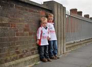 30 July 2011; Tyrone supporters Oran O'Neill, left, aged 3, and his brother Cahir, aged 5, from Aughabrach, Co. Tyrone, on Jones' Road before the game. GAA Football All-Ireland Senior Championship Qualifier, Round 4, Roscommon v Tyrone, Croke Park, Dublin. Picture credit: Dáire Brennan / SPORTSFILE