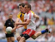 30 July 2011; Niall Carty, Roscommon, in action against Tommy McGuigan, Tyrone. GAA Football All-Ireland Senior Championship Qualifier, Round 4, Roscommon v Tyrone, Croke Park, Dublin. Picture credit: Oliver McVeigh / SPORTSFILE