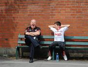 30 July 2011; Danny Browne and his son Emmett, aged 11, from Aghyaran, Co. Tyrone, relax on Clonliffe Road, before the game. GAA Football All-Ireland Senior Championship Qualifier, Round 4, Roscommon v Tyrone, Croke Park, Dublin. Picture credit: Dáire Brennan / SPORTSFILE