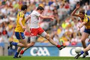 30 July 2011; Sean Cavanagh, Tyrone, shots to score his side's first goal. GAA Football All-Ireland Senior Championship Qualifier, Round 4, Roscommon v Tyrone, Croke Park, Dublin. Picture credit: Oliver McVeigh / SPORTSFILE