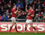 24 February 2017; Darren Sweetnam of Munster celebrates with team-mate Ronan O'Mahony after scoring his side's second try during the Guinness PRO12 Round 16 match between Munster and Scarlets at Thomond Park in Limerick. Photo by Diarmuid Greene/Sportsfile