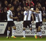 24 February 2017; Ciaran Kilduff, centre, of Dundalk celebrates after scoring his side's second goal with teammates Paddy Barrett, left, and Michael Duffy, right, during the SSE Airtricity League Premier Division match between Dundalk and Shamrock Rovers at Oriel Park, in Dundalk. Photo by David Maher/Sportsfile