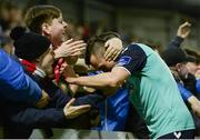 24 February 2017; Aaron McEneff of Derry City celebrates with supporters following his side's fourth goal during the SSE Airtricity League Premier Division match between Bohemians and Derry City at Dalymount Park, in Dublin. Photo by Seb Daly/Sportsfile