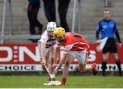 25 February 2017; Cian Waldron of Cuala in action against Meehaul McGrath of Slaughtneil during the AIB GAA Hurling All-Ireland Senior Club Championship Semi-Final match between Cuala and Slaughtneil at the Athletic Grounds in Armagh. Photo by Eóin Noonan/Sportsfile
