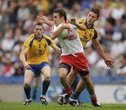 30 July 2011; Mark Donnelly, Tyrone, in action against Karol Mannion, Roscommon. GAA Football All-Ireland Senior Championship Qualifier, Round 4, Roscommon v Tyrone, Croke Park, Dublin. Picture credit: Ray McManus / SPORTSFILE