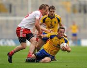 30 July 2011; Kevin Higgins, Roscommon, in action against Tommy McGuigan, Tyrone. GAA Football All-Ireland Senior Championship Qualifier, Round 4, Roscommon v Tyrone, Croke Park, Dublin. Picture credit: Oliver McVeigh / SPORTSFILE