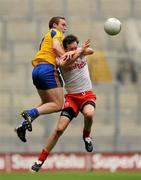 30 July 2011; Colm Cavanagh, Tyrone, in action against Donal Ward, Roscommon. GAA Football All-Ireland Senior Championship Qualifier, Round 4, Roscommon v Tyrone, Croke Park, Dublin. Picture credit: Oliver McVeigh / SPORTSFILE